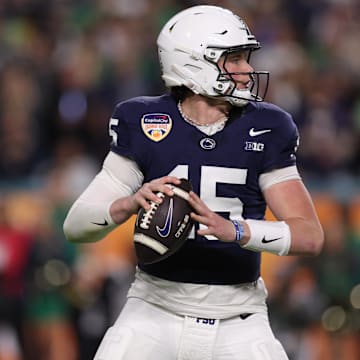 Jan 9, 2025; Miami, FL, USA; Penn State Nittany Lions quarterback Drew Allar (15) looks to pass in the second half against the Notre Dame Fighting Irish in the Orange Bowl at Hard Rock Stadium. Mandatory Credit: Nathan Ray Seebeck-Imagn Images
