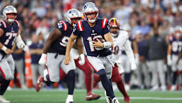 Aug 8, 2025; Foxborough, Massachusetts, USA; New England Patriots quarterback Drake Maye (10) runs the ball during the first half against the Washington Commanders at Gillette Stadium. Mandatory Credit: Paul Rutherford-Imagn Images