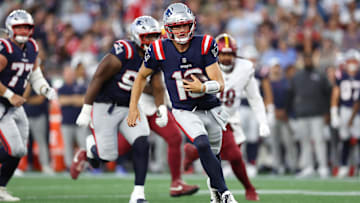 Aug 8, 2025; Foxborough, Massachusetts, USA; New England Patriots quarterback Drake Maye (10) runs the ball during the first half against the Washington Commanders at Gillette Stadium. Mandatory Credit: Paul Rutherford-Imagn Images