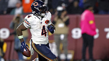 Oct 13, 2025; Landover, Maryland, USA; Chicago Bears running back D'Andre Swift (4) scores a touchdown during the fourth quarter against the Washington Commanders at Northwest Stadium.