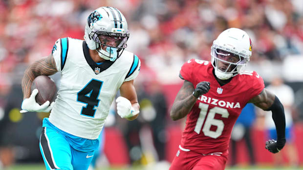 Carolina Panthers wide receiver Tetairoa McMillan (4) runs with the ball against the Cardinals
