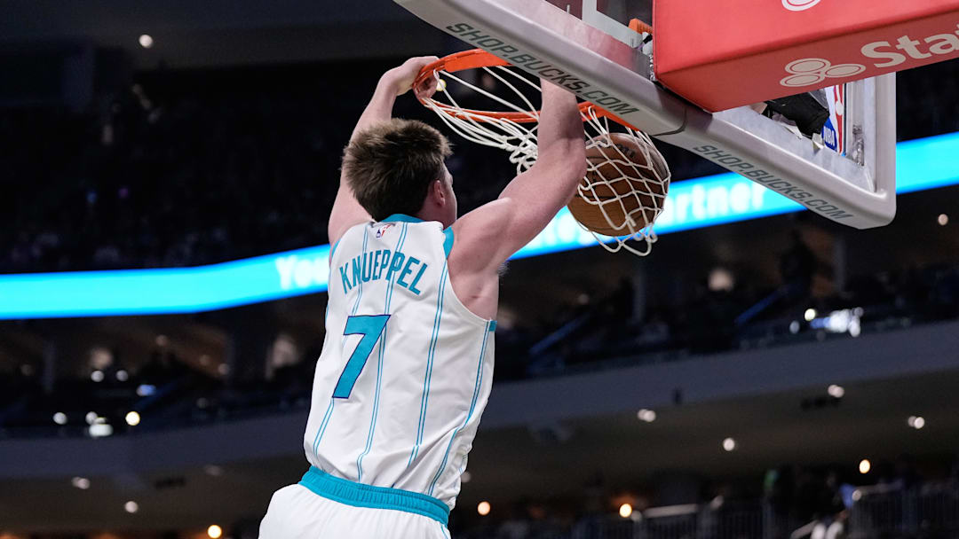 Nov 14, 2025; Milwaukee, Wisconsin, USA;  Charlotte Hornets guard Kon Knueppel (7) dunks during the second quarter against the Milwaukee Bucks at Fiserv Forum. Mandatory Credit: Jeff Hanisch-Imagn Images