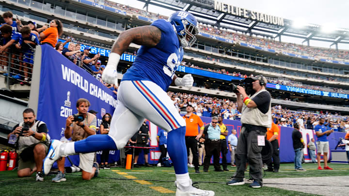 New York Giants defensive tackle Dexter Lawrence (97) sprints onto the field for a preseason game at MetLife Stadium on August 21, 2022, in East Rutherford.

Nfl Ny Giants Preseason Game Vs Bengals Bengals At Giants