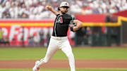 May 17, 2025; Phoenix, Arizona, USA; Arizona Diamondbacks pitcher Zac Gallen (23) pitches against the Colorado Rockies in the first inning at Chase Field. Mandatory Credit: Jacob Reiner-Imagn Images