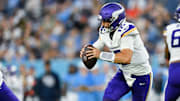 Aug 22, 2025; Nashville, Tennessee, USA;  Minnesota Vikings quarterback Max Brosmer (12) scrambles against the Tennessee Titan during the first half at Nissan Stadium.