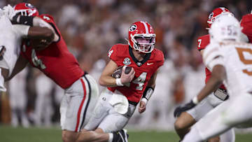 Nov 15, 2025; Athens, Georgia, USA; Georgia Bulldogs quarterback Gunner Stockton (14) runs the ball second half agains the Texas Longhorns at Sanford Stadium. Mandatory Credit: Brett Davis-Imagn Images