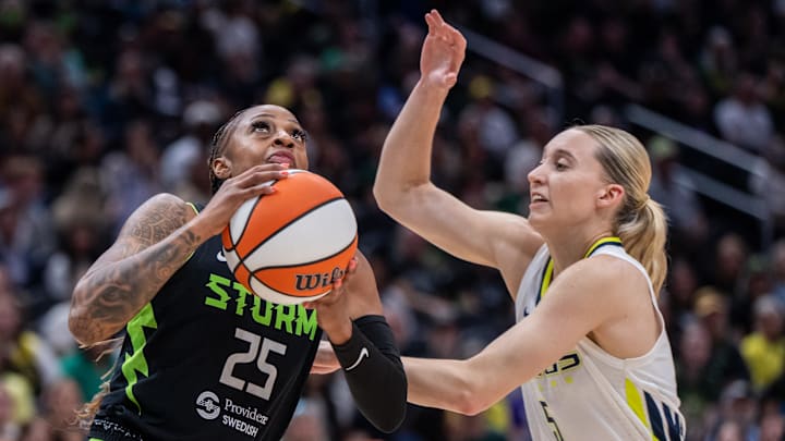 Jul 22, 2025; Seattle, Washington, USA; Seattle Storm guard Tiffany Mitchell shoots the ball against Dallas Wings guard Paige Bueckers (5) during the first half at Climate Pledge Arena. Mandatory Credit: Stephen Brashear-Imagn Images Jul 22, 2025; Seattle, Washington, USA; Seattle Storm guard Tiffany Mitchell shoots the ball against Dallas Wings guard Paige Bueckers (5) during the first half at Climate Pledge Arena. Mandatory Credit: Stephen Brashear-Imagn Images