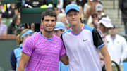 Carlos Alcaraz and Jannik Sinner pose for a photo prior to the start of their semi-final match in the BNP Paribas Open in 2024.
