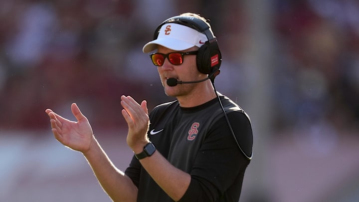 Aug 30, 2025; Los Angeles, California, USA; Southern California Trojans head coach Lincoln Riley watches from the sidelines against the Missouri State Bears in the first half at United Airlines Field at Los Angeles Memorial Coliseum. Mandatory Credit: Kirby Lee-Imagn Images Aug 30, 2025; Los Angeles, California, USA; Southern California Trojans head coach Lincoln Riley watches from the sidelines against the Missouri State Bears in the first half at United Airlines Field at Los Angeles Memorial Coliseum. Mandatory Credit: Kirby Lee-Imagn Images