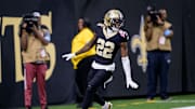 New Orleans Saints wide receiver Rashid Shaheed (22) returns a punt for a touchdown during the second quarter against the Tampa Bay Buccaneers at Caesars Superdome. 