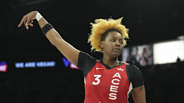 Aug 17, 2025; Las Vegas, Nevada, USA; Las Vegas Aces forward NaLyssa Smith (3) reacts to hitting a 3-pointer against the Dallas Wings in the fourth quarter of their game at Michelob Ultra Arena. Mandatory Credit: Candice Ward-Imagn Images