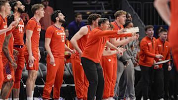 Mar 14, 2025; Charlotte, NC, USA; Clemson Tigers head coach Brad Brownell and his bench react to his teams offense late during the second half against the Louisville Cardinals at Spectrum Center. Mandatory Credit: Jim Dedmon-Imagn Images