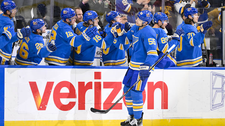 Mar 1, 2025; St. Louis, Missouri, USA; St. Louis Blues defenseman Colton Parayko (55) is congratulated by teammates after scoring against the Los Angeles Kings during the first period at Enterprise Center. Mandatory Credit: Jeff Curry-Imagn Images Mar 1, 2025; St. Louis, Missouri, USA; St. Louis Blues defenseman Colton Parayko (55) is congratulated by teammates after scoring against the Los Angeles Kings during the first period at Enterprise Center. Mandatory Credit: Jeff Curry-Imagn Images