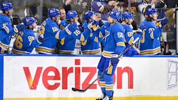 Mar 1, 2025; St. Louis, Missouri, USA;  St. Louis Blues defenseman Colton Parayko (55) is congratulated by teammates after scoring against the Los Angeles Kings during the first period at Enterprise Center. Mandatory Credit: Jeff Curry-Imagn Images