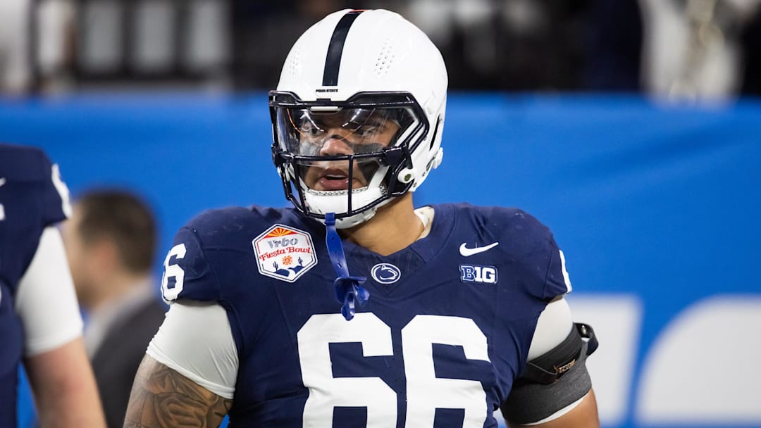 Dec 31, 2024; Glendale, AZ, USA; Penn State Nittany Lions offensive lineman Drew Shelton (66) against the Boise State Broncos during the Fiesta Bowl at State Farm Stadium. Mandatory Credit: Mark J. Rebilas-Imagn Images