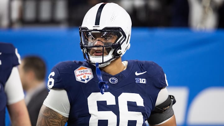 Dec 31, 2024; Glendale, AZ, USA; Penn State Nittany Lions offensive lineman Drew Shelton (66) against the Boise State Broncos during the Fiesta Bowl at State Farm Stadium. Mandatory Credit: Mark J. Rebilas-Imagn Images