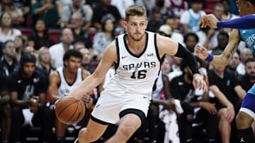 Jul 7, 2023; Las Vegas, NV, USA; San Antonio Spurs guard Erik Stevenson (16) drives the ball against the Charlotte Hornets during the second half at Thomas & Mack Center. Mandatory Credit: Lucas Peltier-Imagn Images