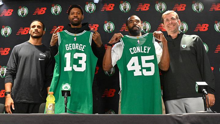 September 15, 2026; Boston, Massachusetts, USA; Boston Celtics head coach Joe Mazzulla (left) and president of basketball operations Brad Stevens (right) pose for a photo with forward Paul George (13) and guard Mike Conley (45) after a press conference introducing George and Conley to the Boston media at The Auerbach Center at Boston Landing.. Mandatory Credit: Eric Canha-Imagn Images