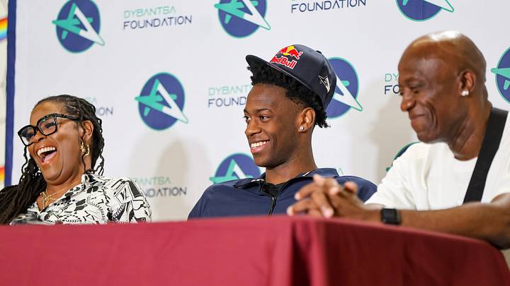 Next to his mother Chelsea and father Ace, Brockton’s AJ Dybantsa declares for the 2026 NBA Draft at Davis School (K-8) in Brockton, Massachusetts on Thursday, April 23, 2026.
