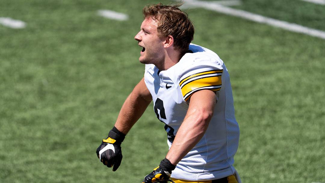 Iowa defensive back Zach Lutmer (6) reacts after it was announced Kaden Wetjen was selected in the NFL draft April 25, 2026, during the team’s spring practice at Kinnick Stadium in Iowa City, Iowa.