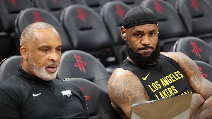 Los Angeles Lakers forward LeBron James (23) looks over video with assistant coach Phil Handy before playing against the Houston Rockets at Toyota Center. Mandatory Credit: Thomas Shea-USA TODAY Sports
