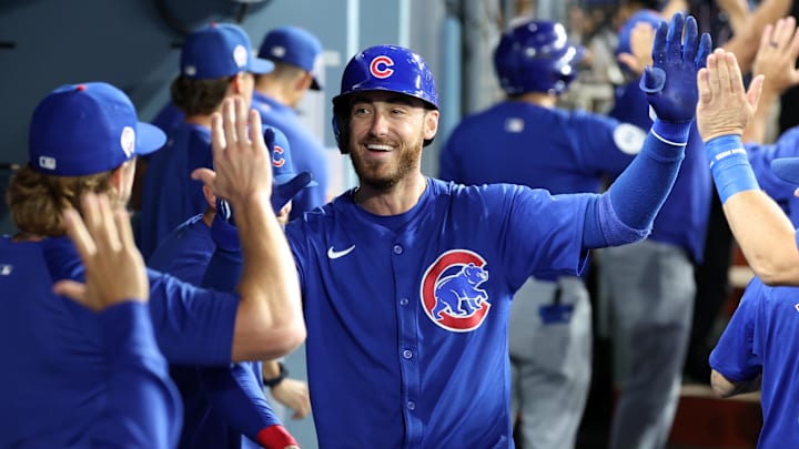 Sep 11, 2024; Los Angeles, California, USA; Chicago Cubs right fielder Cody Bellinger (24) is greeted in the dugout after hitting a 3-run home run during the fifth inning against the Los Angeles Dodgers at Dodger Stadium. Mandatory Credit: Kiyoshi Mio-Imagn Images Sep 11, 2024; Los Angeles, California, USA; Chicago Cubs right fielder Cody Bellinger (24) is greeted in the dugout after hitting a 3-run home run during the fifth inning against the Los Angeles Dodgers at Dodger Stadium. Mandatory Credit: Kiyoshi Mio-Imagn Images