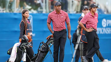 Dec 22, 2024; Orlando, Florida, [USA]; Tiger Woods son Charlie Woods and daughter Sam Woods look on during the PNC Championship at The Ritz-Carlton Golf Club. Mandatory Credit: Nathan Ray Seebeck-Imagn Images