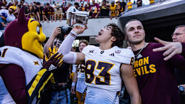 Nov 30, 2024; Tucson, Arizona, USA; Arizona State Sun Devils wide receiver Derek Eusebio (83) drinks out of the Territorial Cup at the end of the game against the Arizona Wildcats at Arizona Stadium. Mandatory Credit: Aryanna Frank-Imagn Images