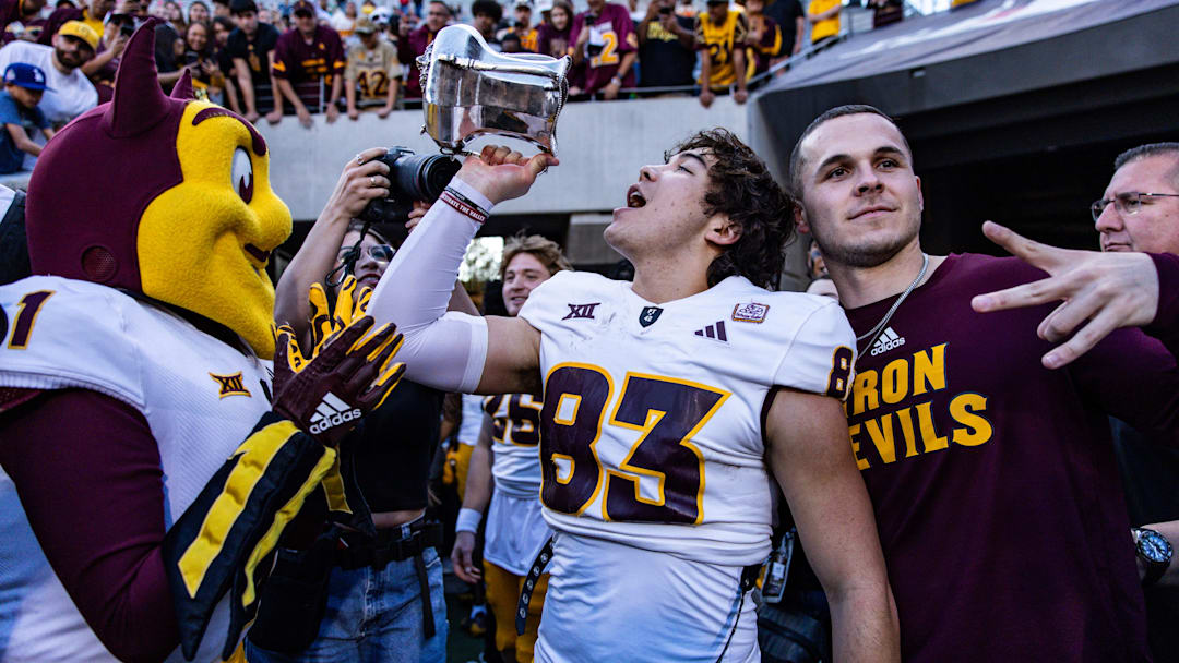 Nov 30, 2024; Tucson, Arizona, USA; Arizona State Sun Devils wide receiver Derek Eusebio (83) drinks out of the Territorial Cup at the end of the game against the Arizona Wildcats at Arizona Stadium. Nov 30, 2024; Tucson, Arizona, USA; Arizona State Sun Devils wide receiver Derek Eusebio (83) drinks out of the Territorial Cup at the end of the game against the Arizona Wildcats at Arizona Stadium.