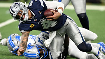 Dallas Cowboys quarterback Dak Prescott (4) is sacked by Detroit Lions linebacker Al-Quadin Muhammad (96) 