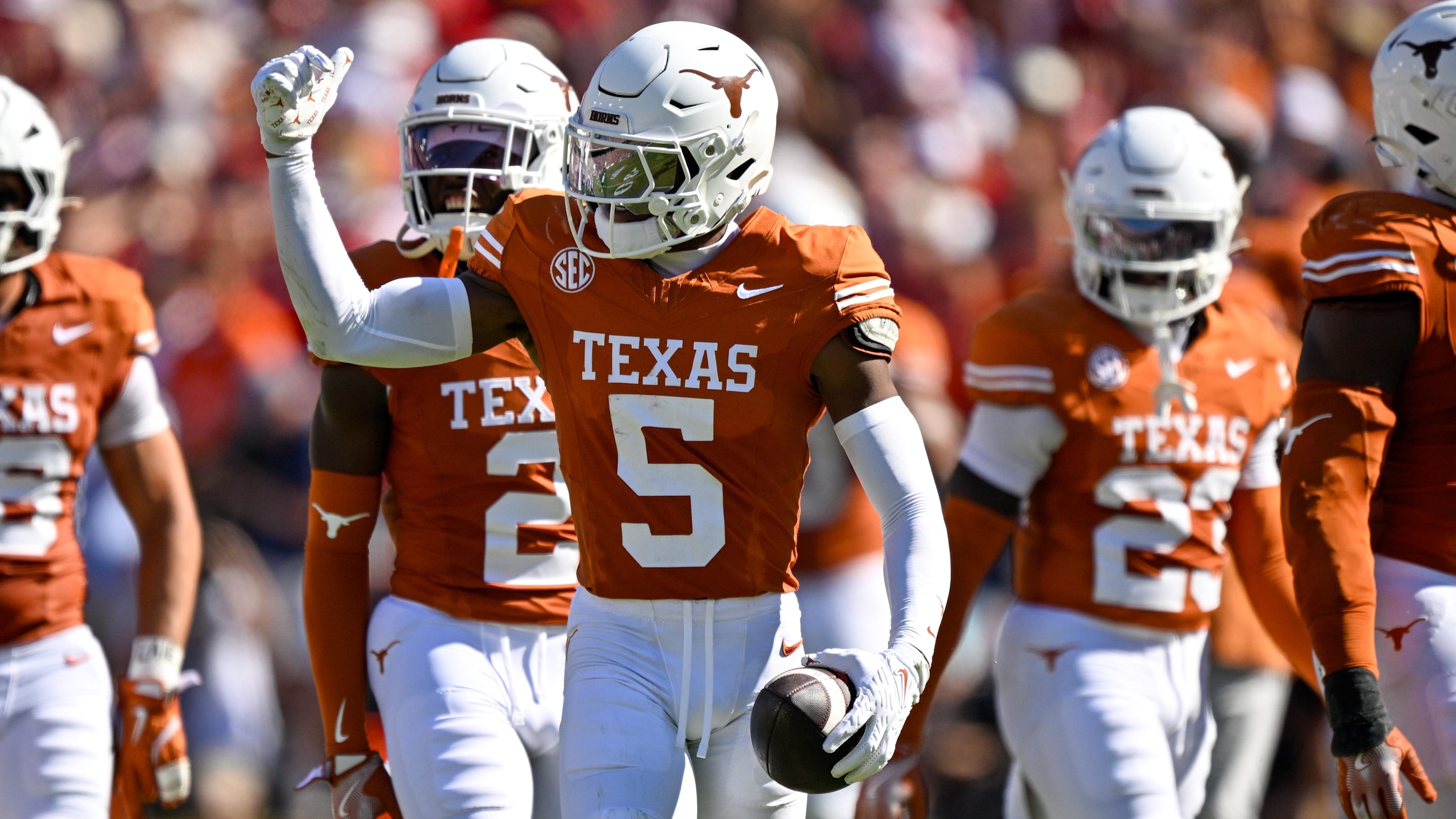 Texas Longhorns defensive back Malik Muhammad celebrates after an interception.