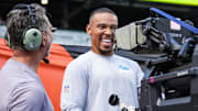 Detroit Lions wide receiver Amon-Ra St. Brown (14) talks to a TV camera operator during warmup ahead of Cincinnati Bengals game at Paycor Stadium in Cincinnati on Sunday, Oct. 5, 2025.