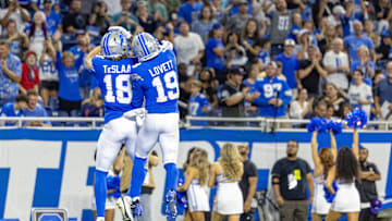 Aug 23, 2025; Detroit, Michigan, USA; Detroit Lions wide receiver Isaac TeSlaa (18) celebrates his touchdown against the Houston Texans with wide receiver Dominic Lovett (19) during the first half at Ford Field. Mandatory Credit: David Reginek-Imagn Images