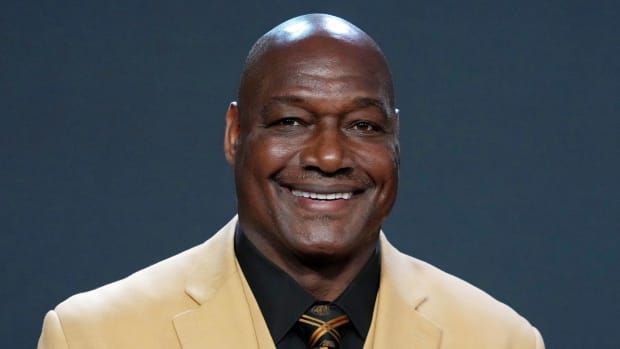 Derrick Brooks poses for a photo on the red carpet before the NFL Honors award show at Symphony Hall.