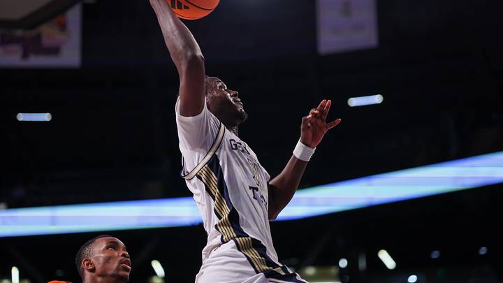 Feb 18, 2026; Atlanta, Georgia, USA; Georgia Tech Yellow Jackets forward Baye Ndongo (11) dunks against the Virginia Cavaliers in the second half at McCamish Pavilion. Mandatory Credit: Brett Davis-Imagn Images
