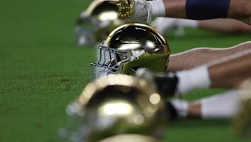 Jan 9, 2025; Miami, FL, USA; General view of Notre Dame Fighting Irish helmets before the game against the Penn State Nittany Lions in the Orange Bowl at Hard Rock Stadium. Mandatory Credit: Nathan Ray Seebeck-Imagn Images