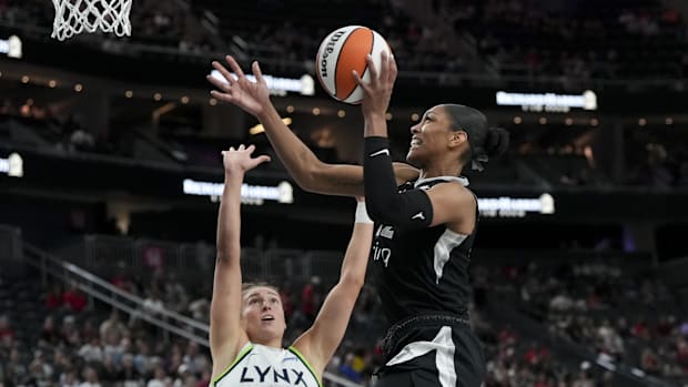 Las Vegas Aces center A'ja Wilson (22) shoots against Minnesota Lynx forward Jessica Shepard 