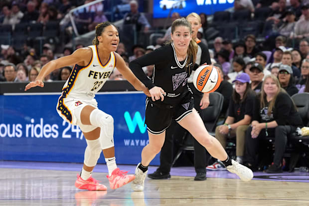 Golden State Valkyries guard Kate Martin dribbles against Indiana Fever guard Aerial Powers. 