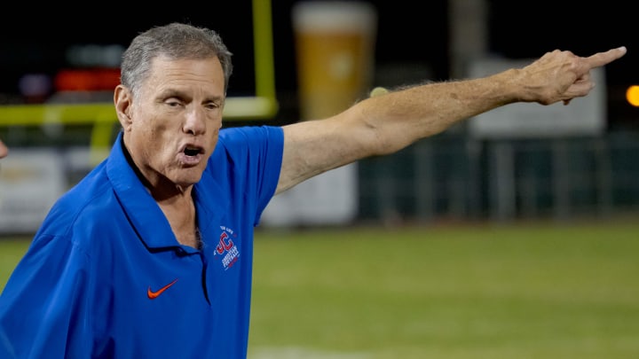 John Curtis (Louisiana) High School football coach John T. Curtis has the most wins in the nation among active coaches. 