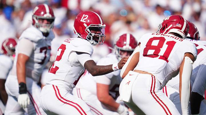 Alabama Crimson Tide quarterback Keelon Russell (12) yells at Alabama Crimson Tide tight end Kaleb Edwards (81) during a moment of confusion while playing Kentucky Saturday, Sept. 12, 2026 in Lexington, Kentucky.