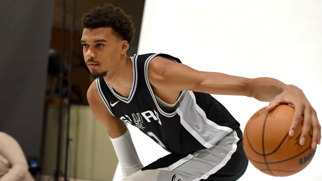 Sep 30, 2024; San Antonio, Texas, USA; San Antonio Spurs star Victor Wembanyama (1) poses for a photo shoot during the team's Media Day at Victory Capital Performance Center.