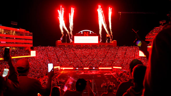 Oct 1, 2022; Lincoln, Nebraska, USA; Fans participate in a light show at the end of the third quarter between the Nebraska Cornhuskers and the Indiana Hoosiers at Memorial Stadium.