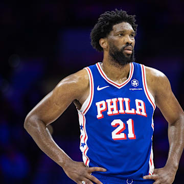 Feb 20, 2025; Philadelphia, Pennsylvania, USA; Philadelphia 76ers center Joel Embiid (21) looks on during the third quarter against the Boston Celtics at Wells Fargo Center. Mandatory Credit: Bill Streicher-Imagn Images
