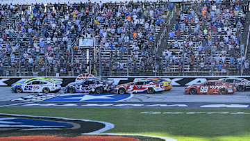 May 4, 2025; Fort Worth, Texas, USA; A view of the field of cars at the start of overtime during the Wurth 400 race at Texas Motor Speedway. Mandatory Credit: Jerome Miron-Imagn Images