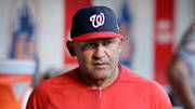 Washington Nationals bench coach Miguel Cairo walks in the dugout.