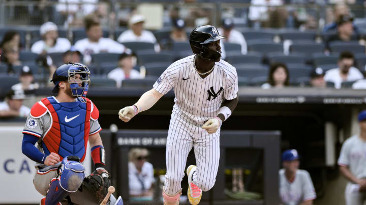 New York Yankees third baseman Jazz Chisholm Jr. (13) hits a single against the Texas Rangers during the second inning at Yankee Stadium on Aug 10.