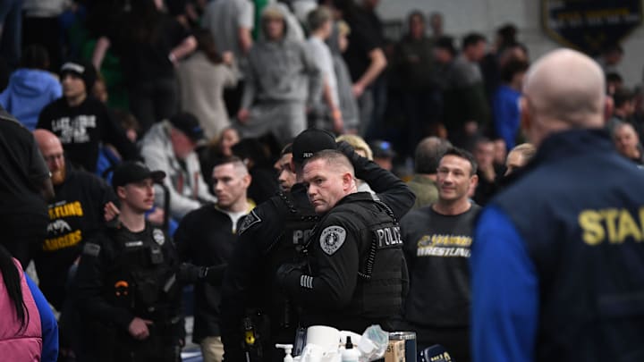 Police respond after a fight broke out in the stands during the final round of the District 25 wrestling tournament held at Collingswood High School on Saturday, February 22, 2025.