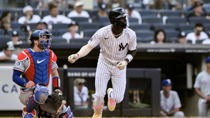 Aug 10, 2024; Bronx, New York, USA; New York Yankees third baseman Jazz Chisholm Jr. (13) hits a single against the Texas Rangers during the second inning at Yankee Stadium. Mandatory Credit: John Jones-USA TODAY Sports