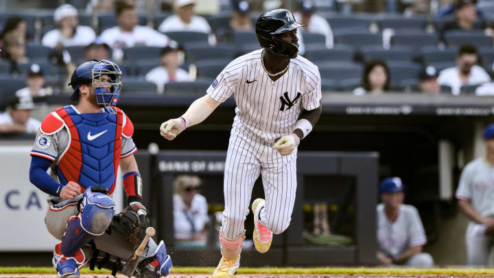 Aug 10, 2024; Bronx, New York, USA; New York Yankees third baseman Jazz Chisholm Jr. (13) hits a single against the Texas Rangers during the second inning at Yankee Stadium. Mandatory Credit: John Jones-USA TODAY Sports