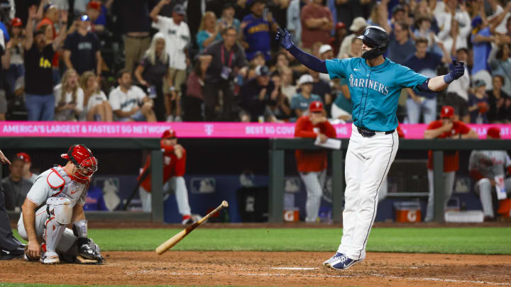 Mitch Haniger celebrates a walk-off walk